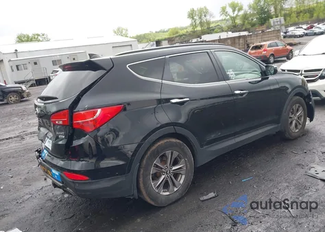 2014 Hyundai Santa Fe Sport 2.4L z USA, uszkodzony, nr VIN 5XYZUDLB0EG217212